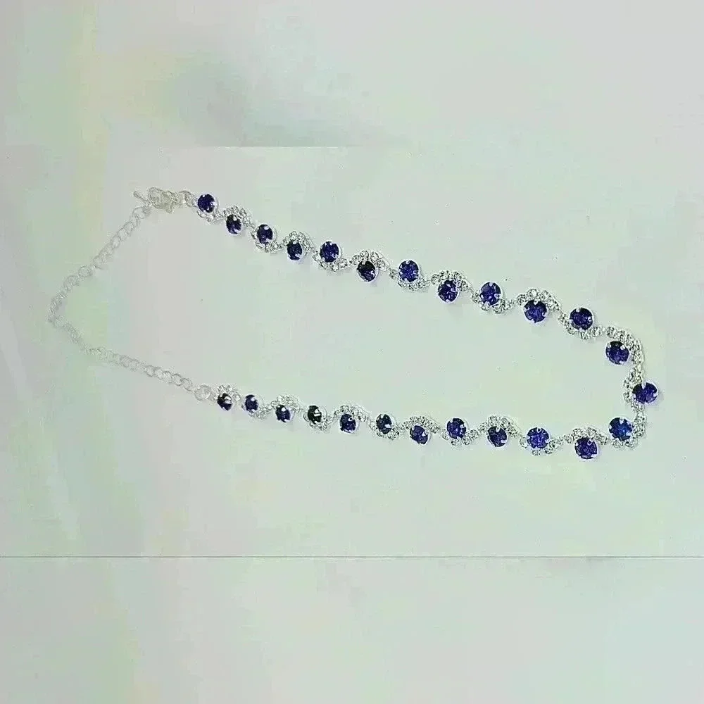 NWOT Stunning Wave Shape Blue Zircon And Crystal Necklace and Earrings S…